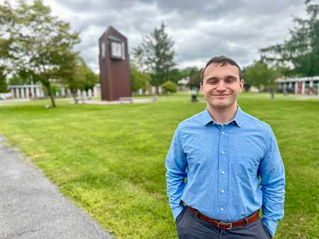 Chris Fuller in front of the JCC clock tower