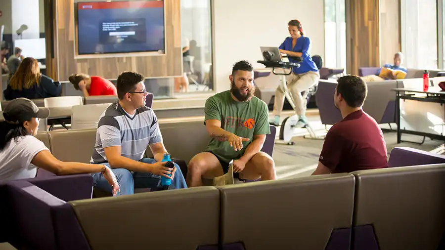 Group of students in Veterans lounge